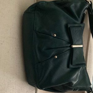 Small, teal colored Elle purse. Shoulder purse. Used, like new. Polka dot lining